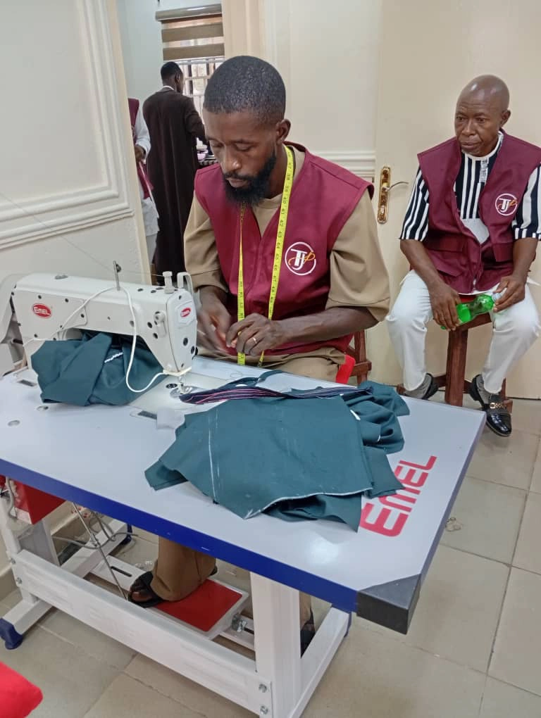 Photo of a TJ Fashion Nova Tailor at Work
